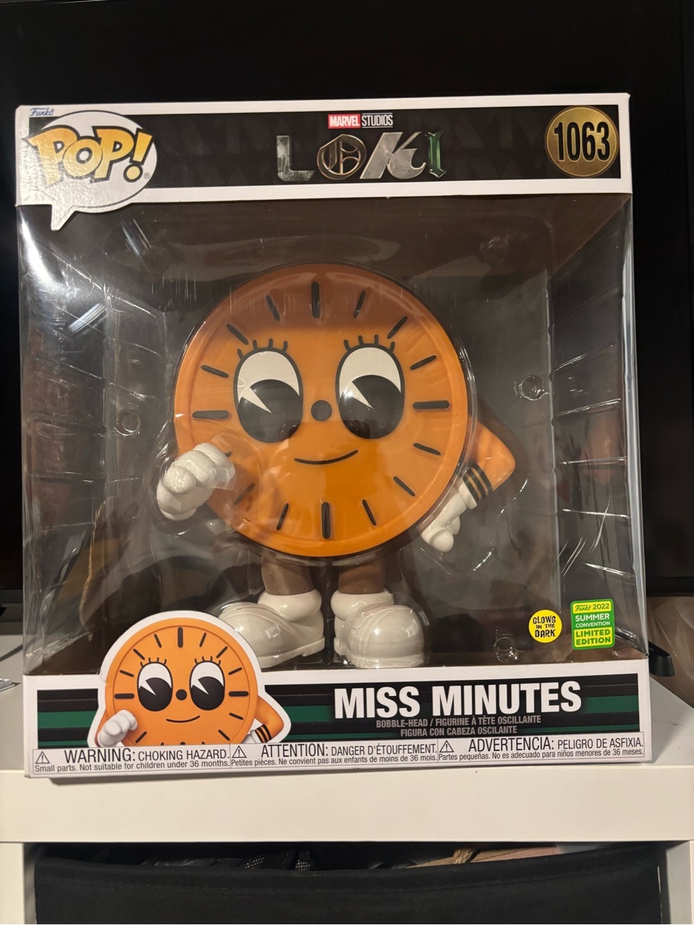 Bright orange Miss Minutes Funko Pop!
